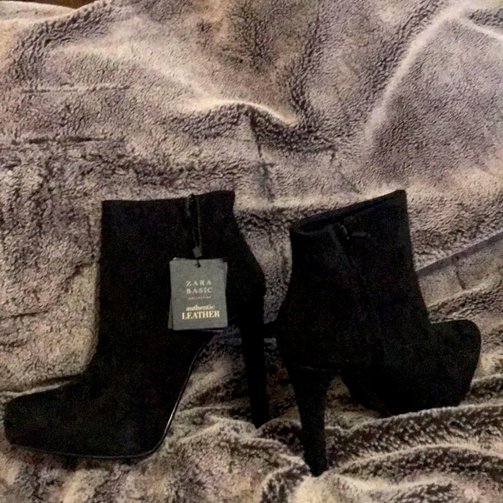Authentic suede/leather high healed boots.